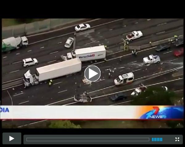 M4 crash - truck smashes through concrete barrier