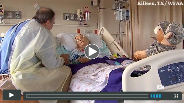Troops flock to bedside of sick Hug Lady