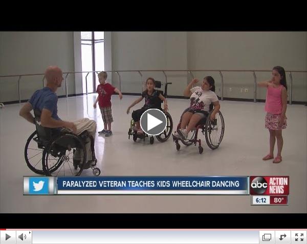 Dwayne Sheuneman teaches kids how to dance in wheelchairs