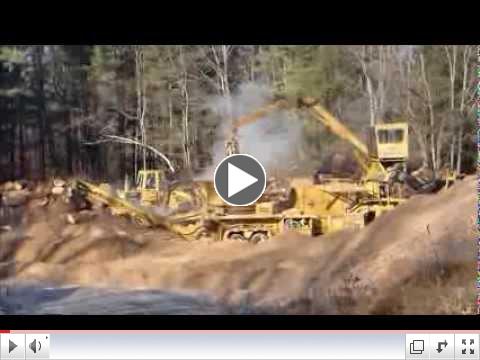 Grinding logs for mulch