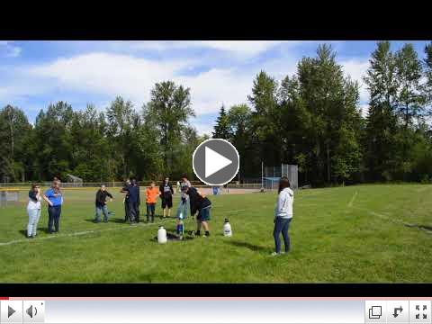 Students at Maple View Middle School test their 2-liter bottle rockets.