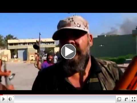 Rebels celebrate inside Gaddafi compound