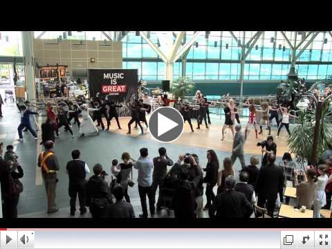 THE BRITISH BURST INTO YVR!  VANCOUVER AIRPORT FLASH MOB