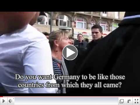 Female Protester Disrupts Muslim Radicals Rallying in Frankfurt, Germany