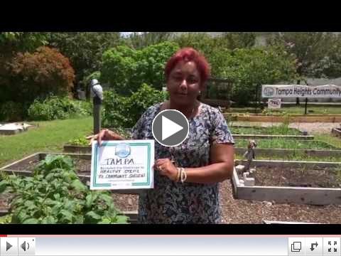 Michele Ogilvie, Garden Steps project manager accepts the challenge on behelf of the Hillsborough MPO
