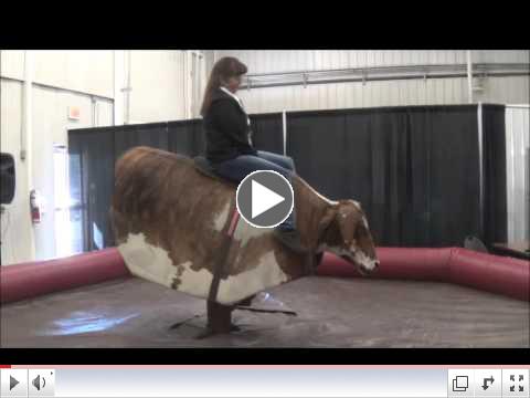 Country Road RV's Cheryl Adams having a little fun at our Indoor Show and Sale at the Cow Palace in Olds, Alberta. 