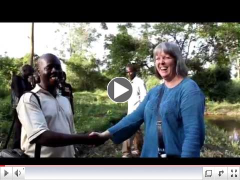 How Ugandans shake hands