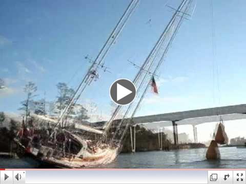 How to get a 80ft mast under a 65ft bridge!