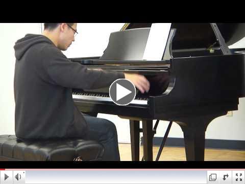 Trying a piano at the Steinway factory