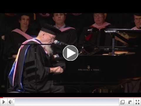 Composer Terry Riley, this year's receipient of an honorary doctorate degree, performs a piano improvisation at commencement ceremonies.