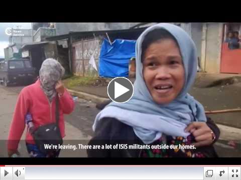 As Philippine government declares martial law in Mindanao, residents flee their homes to escape fighting between government troops and rebels linked to Islamic State.