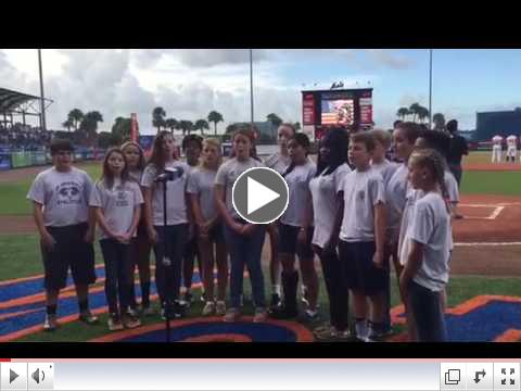 Singers for the Son Perform the National Anthem before the game.