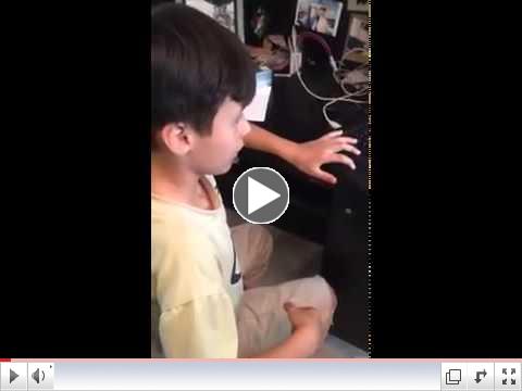 9 year old programs a ROBO Cylinder