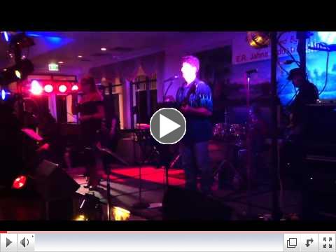 Aidan rocks with The Slick Willy Band