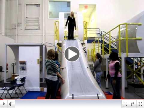Jackie demonstrates emergency slide