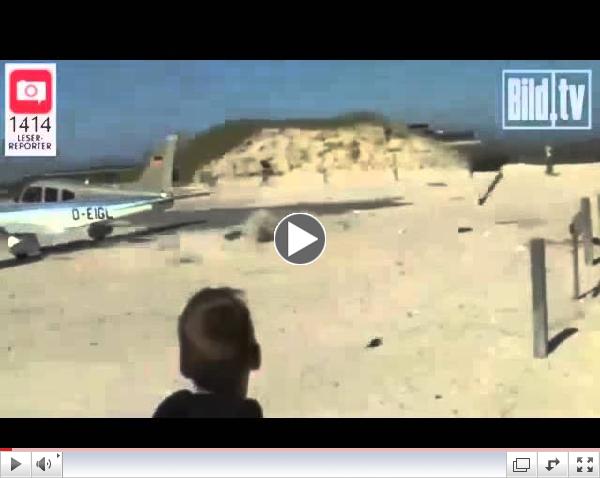 9RAW: Small plane almost lands on sunbather