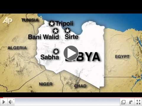 Some Libyan Fighters Claim Gadhafi Surrounded