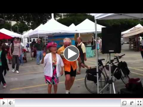 Patricia Bragg dancing at Ala Moana Farmers' Market