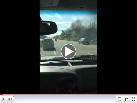 Burning RV on highway