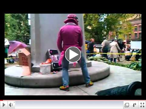 Occupy Portland Protester Dances On Soldiers' Monument