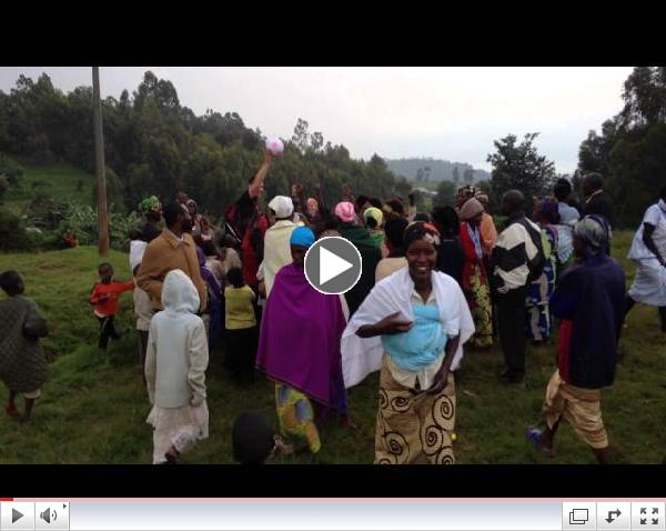 Ryan giving away a ball to the local people in Giheke