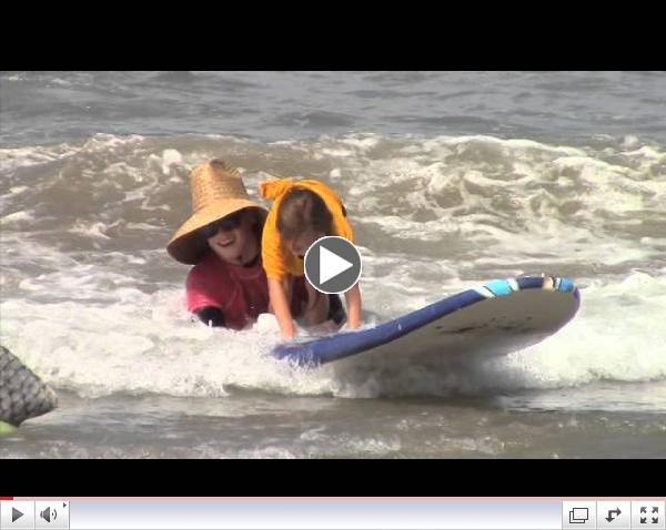 H.E.E.A.L. Provides Surf Happens day for Girls Inc.